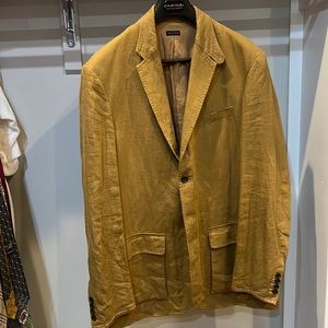 Tan linen jacket with leather trim.